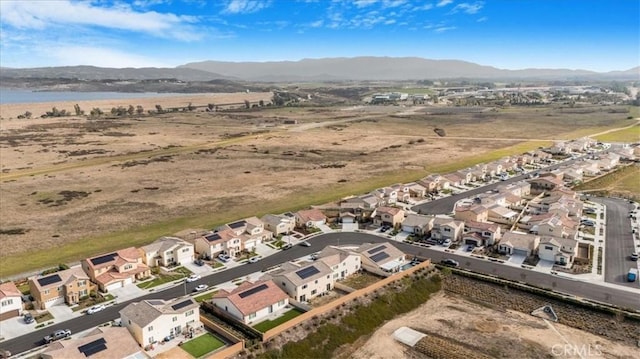 bird's eye view featuring a residential view and a mountain view