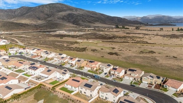 birds eye view of property featuring a residential view and a mountain view