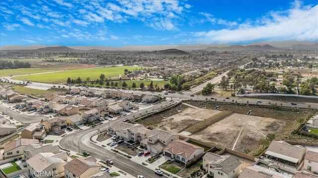 aerial view featuring a mountain view and a residential view