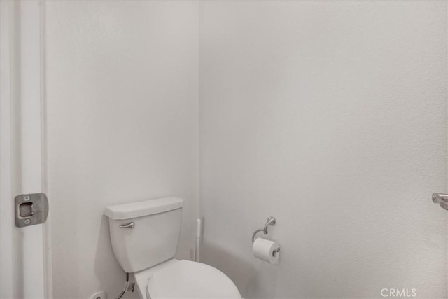 bathroom featuring toilet