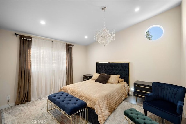 bedroom featuring vaulted ceiling, recessed lighting, and an inviting chandelier