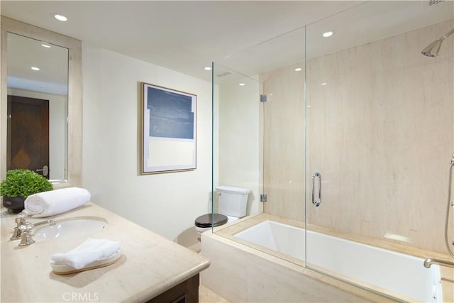 full bathroom with enclosed tub / shower combo, recessed lighting, and vanity