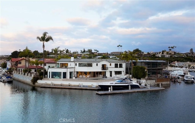 exterior space with a water view