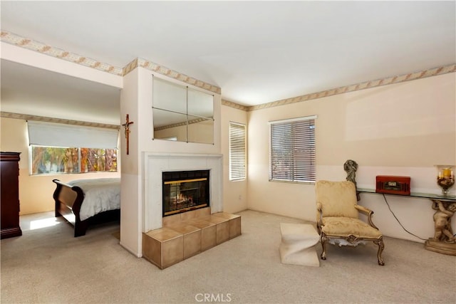 interior space featuring a fireplace and carpet flooring