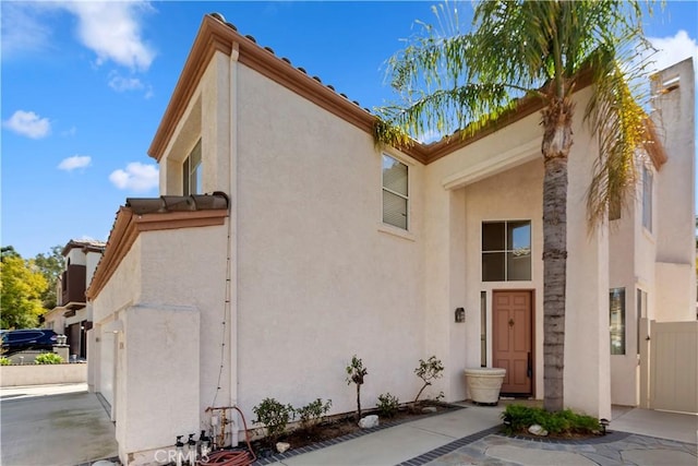 view of front of house featuring stucco siding