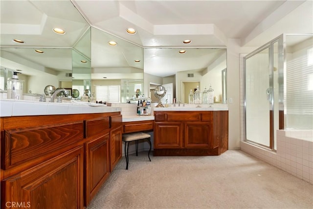 bathroom featuring recessed lighting, carpet flooring, a shower stall, and vanity