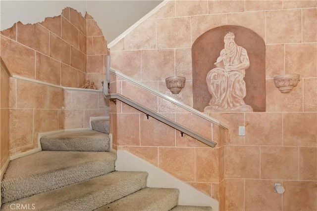 stairway with crown molding