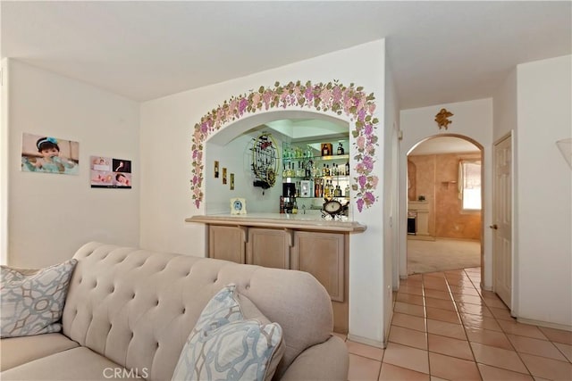 living room featuring light tile patterned floors