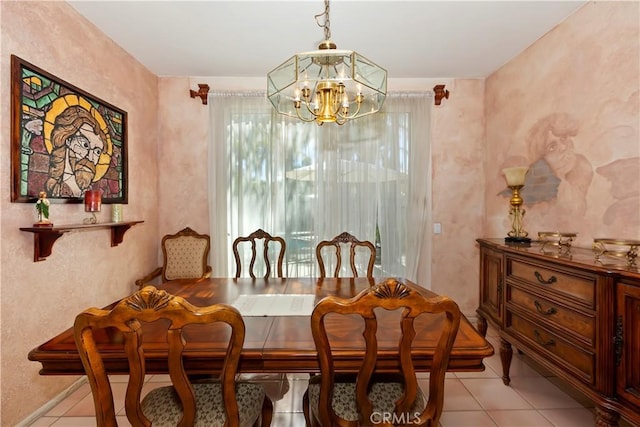 dining space featuring a notable chandelier and tile patterned floors