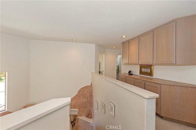 kitchen featuring light countertops and recessed lighting