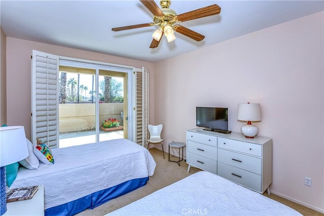 carpeted bedroom with access to outside and ceiling fan