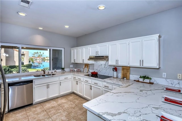 kitchen with black electric stovetop, visible vents, stainless steel dishwasher, a sink, and under cabinet range hood