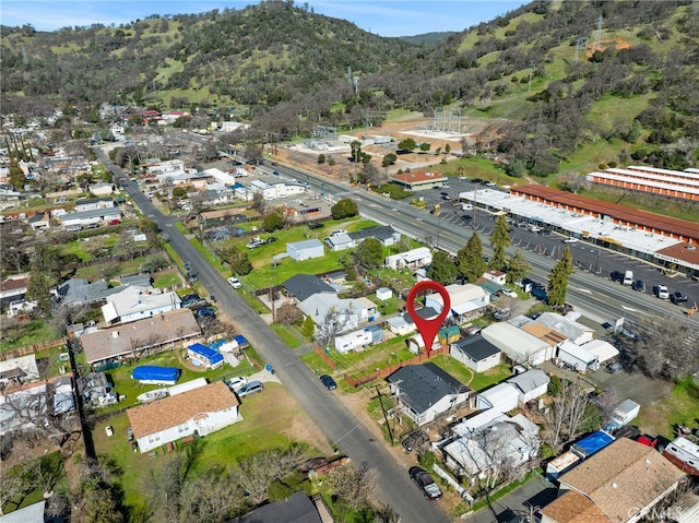 bird's eye view with a mountain view