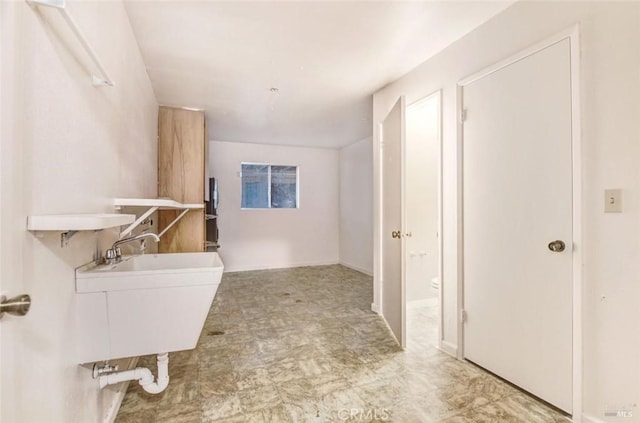 laundry room with a sink