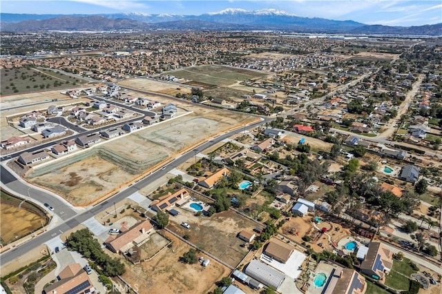 drone / aerial view featuring a mountain view