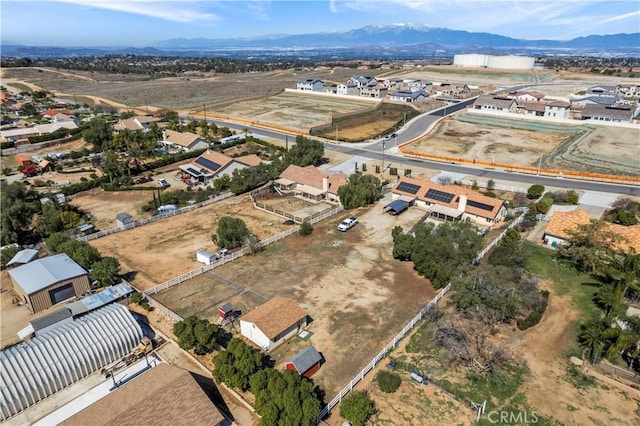 drone / aerial view featuring a mountain view