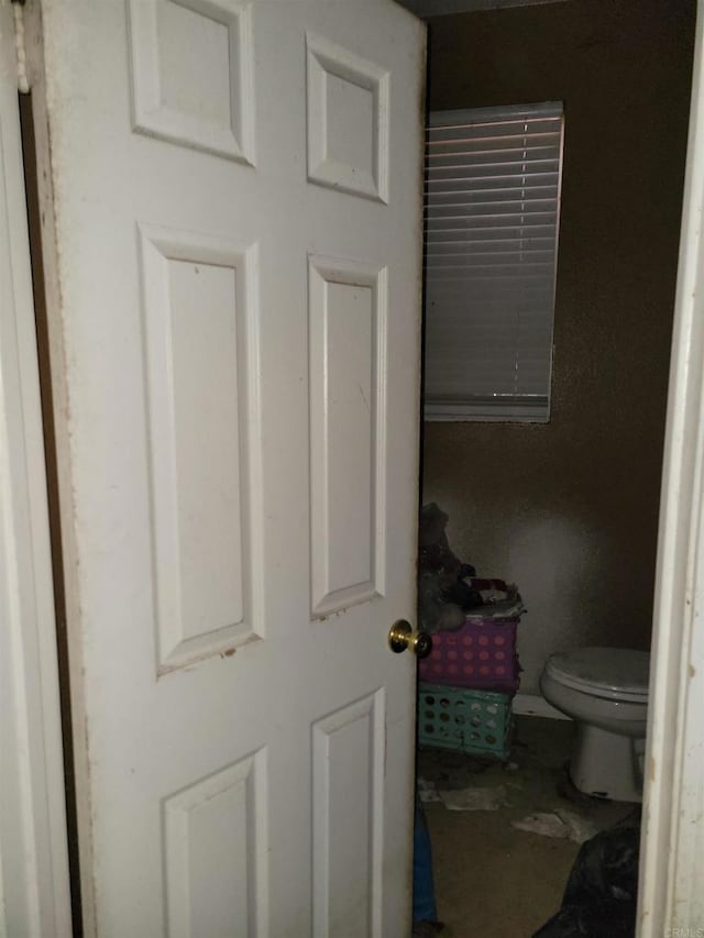 bathroom featuring toilet