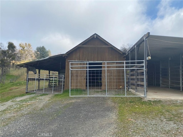 view of outdoor structure featuring an outbuilding and an exterior structure