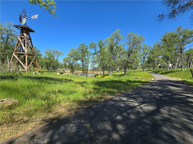 surrounding community featuring a water view