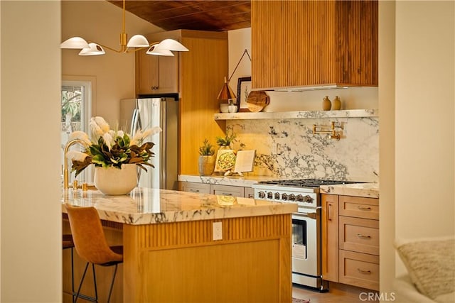 kitchen with light stone counters, wood ceiling, appliances with stainless steel finishes, a kitchen bar, and tasteful backsplash