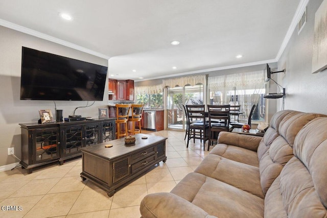 living room featuring baseboards, recessed lighting, light tile patterned flooring, and crown molding