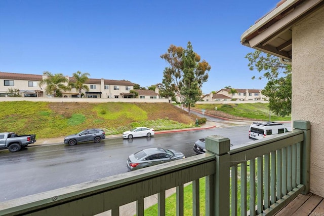 balcony featuring a residential view