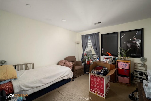 carpeted bedroom with visible vents