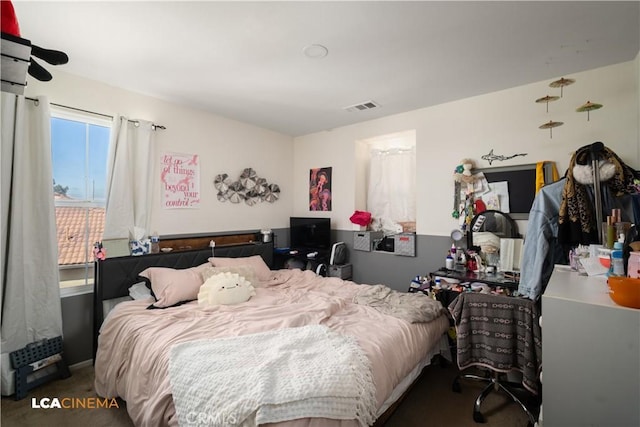 bedroom with visible vents