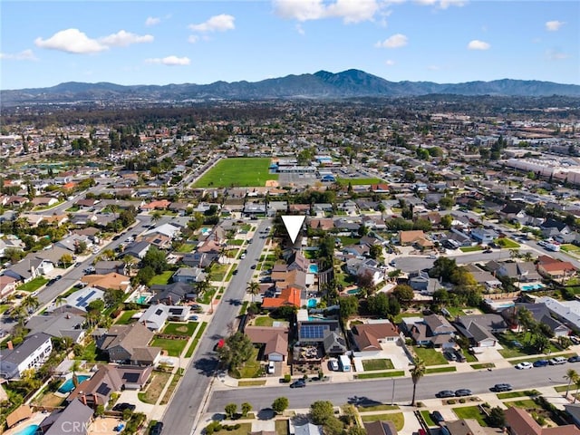 bird's eye view featuring a residential view and a mountain view