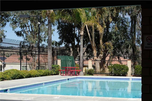 pool featuring fence