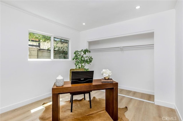 office space with recessed lighting, baseboards, and wood finished floors