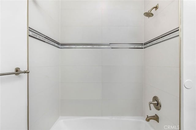 bathroom featuring shower / washtub combination
