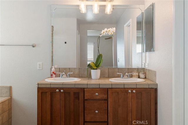 full bath with double vanity and a sink