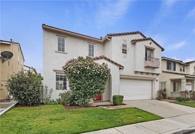 mediterranean / spanish-style house with stucco siding, an attached garage, driveway, and a tiled roof