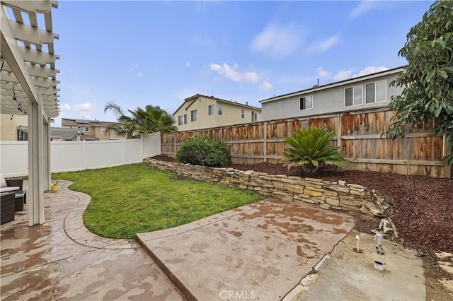 view of yard featuring a fenced backyard, a pergola, and a patio area