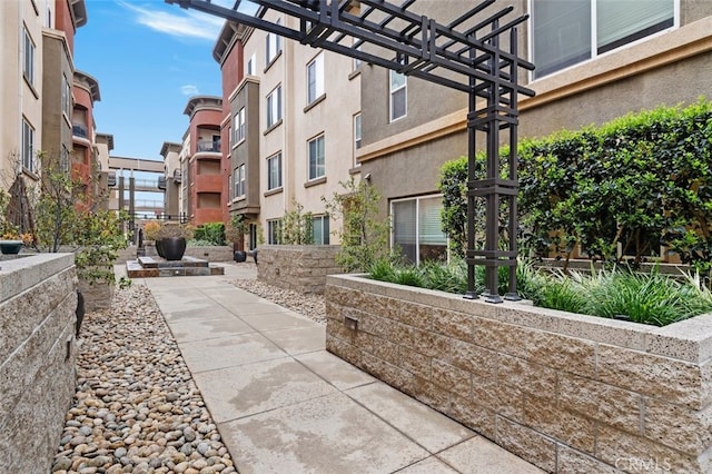 view of home's community with a patio