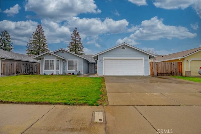 ranch-style home with a front yard, concrete driveway, fence, and an attached garage