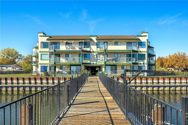 surrounding community featuring a water view