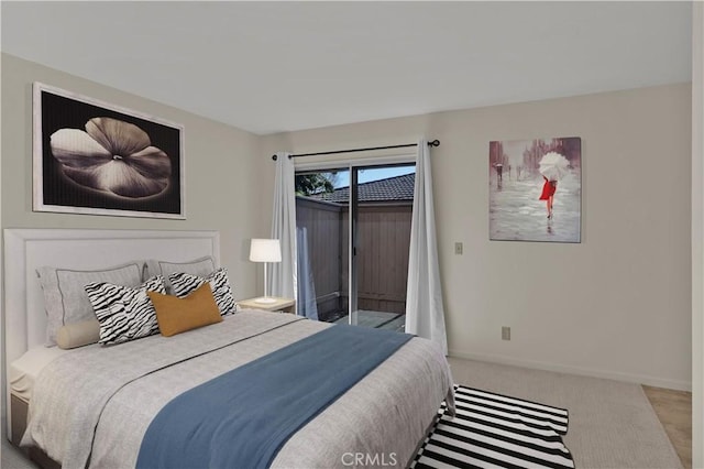 bedroom with access to outside, baseboards, and carpet floors