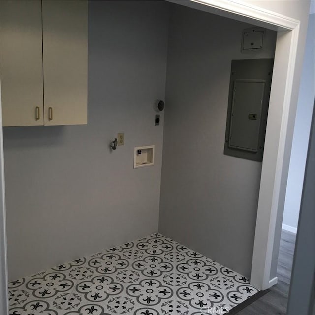 laundry room with electric panel, cabinet space, washer hookup, and hookup for an electric dryer