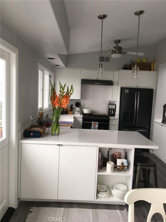 kitchen with black appliances, light countertops, white cabinetry, ceiling fan, and modern cabinets