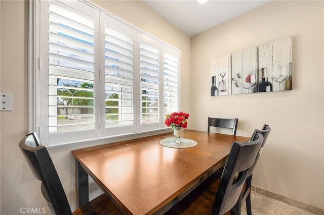 dining room with baseboards