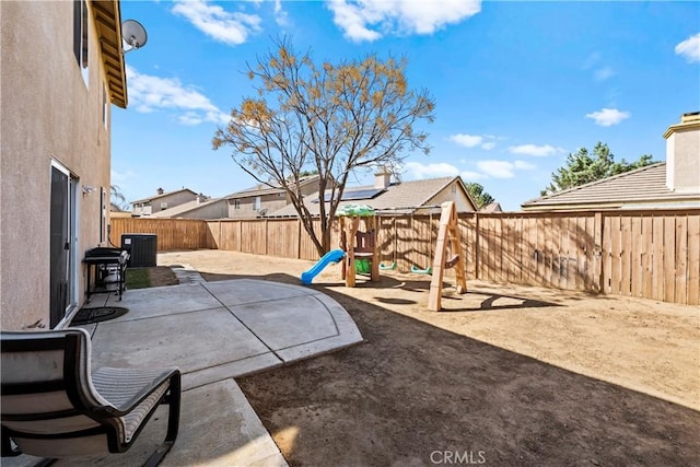 view of patio / terrace with a fenced backyard and central AC