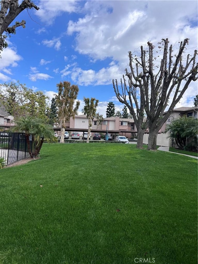 view of yard featuring fence