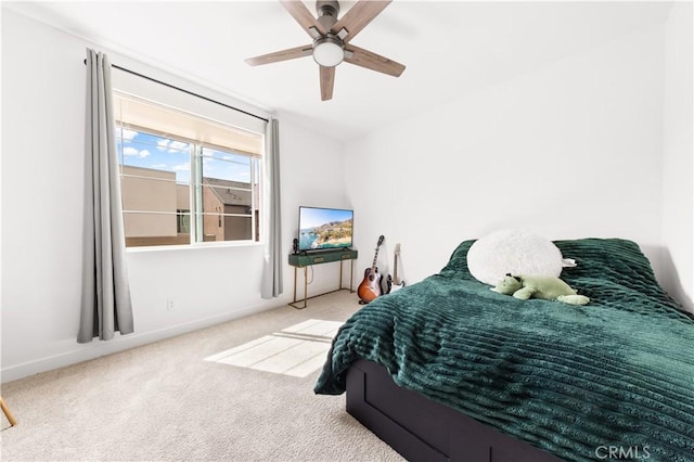 bedroom featuring carpet and a ceiling fan