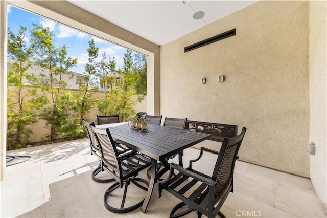 view of patio featuring outdoor dining space