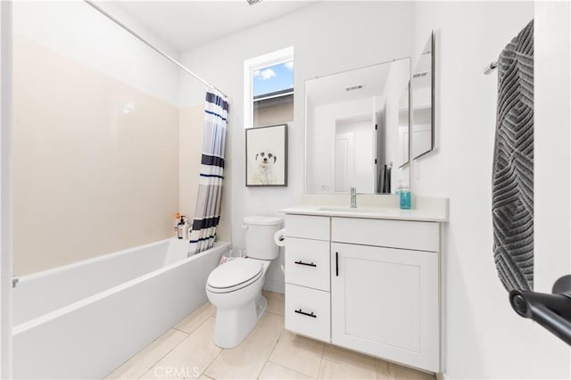 bathroom with tile patterned flooring, toilet, visible vents, vanity, and shower / bath combo