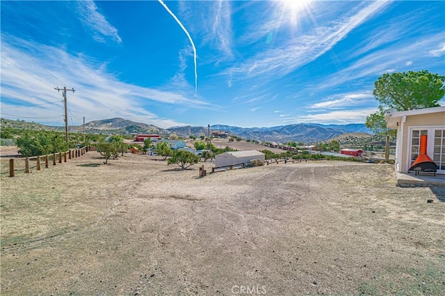 view of mountain feature featuring a rural view