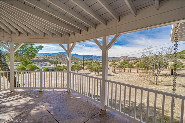 view of patio / terrace with a mountain view