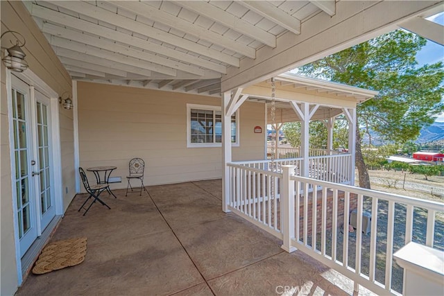 view of patio featuring french doors